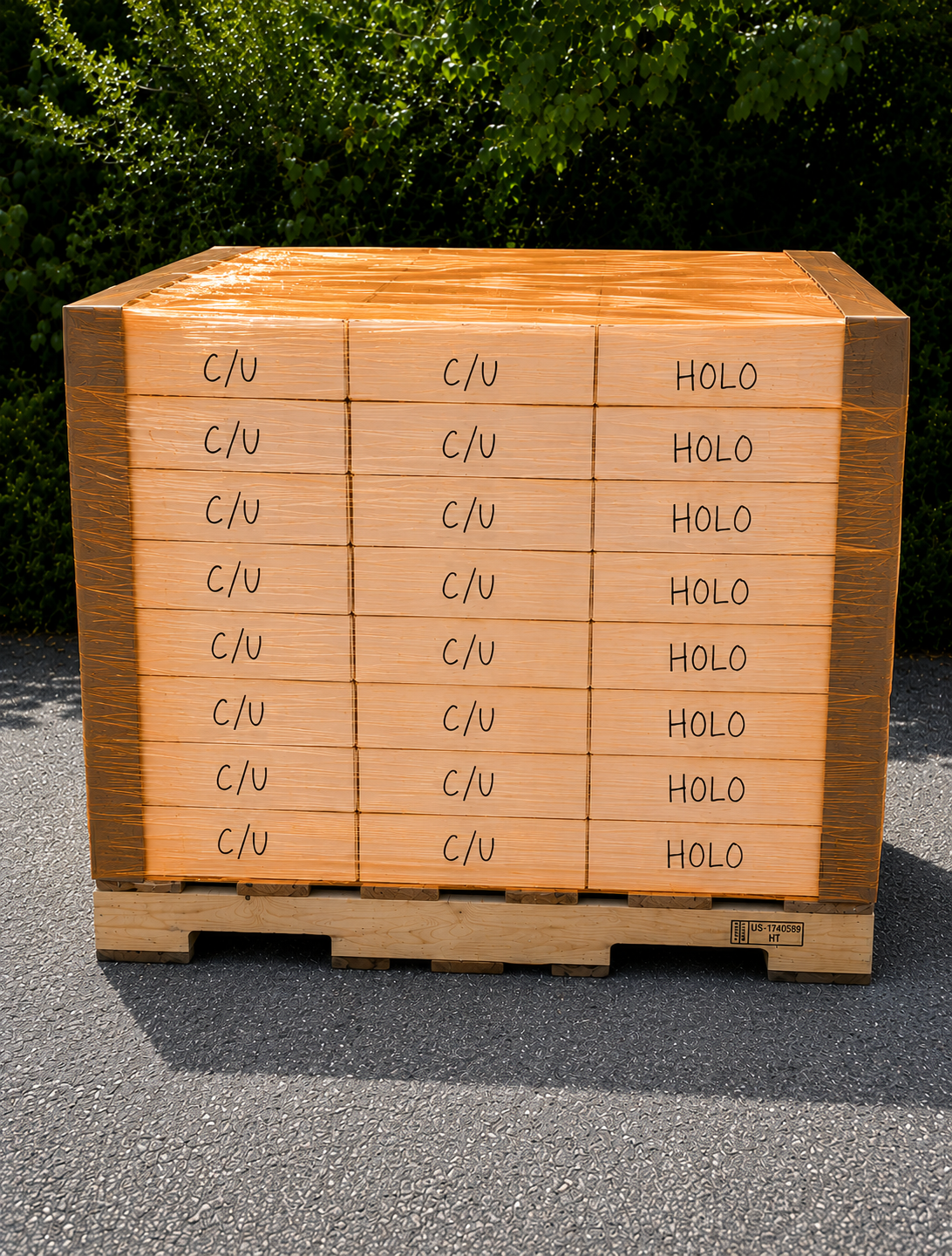 Properly stretch-wrapped freight pallet containing labeled boxes of Pokémon bulk cards for BulkX pickup.